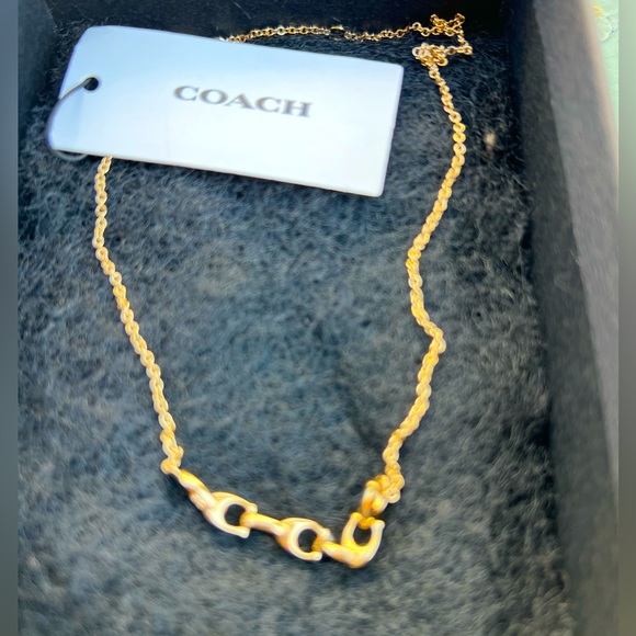 COACH Linked Signature Gold Necklace. - Picture 2 of 3